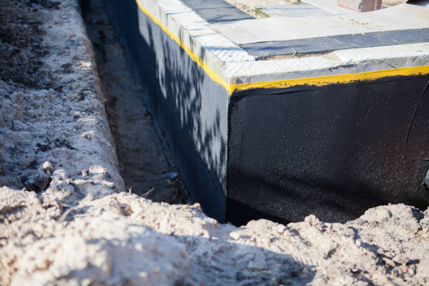 Professional Waterproofing technician working in Marion, KY